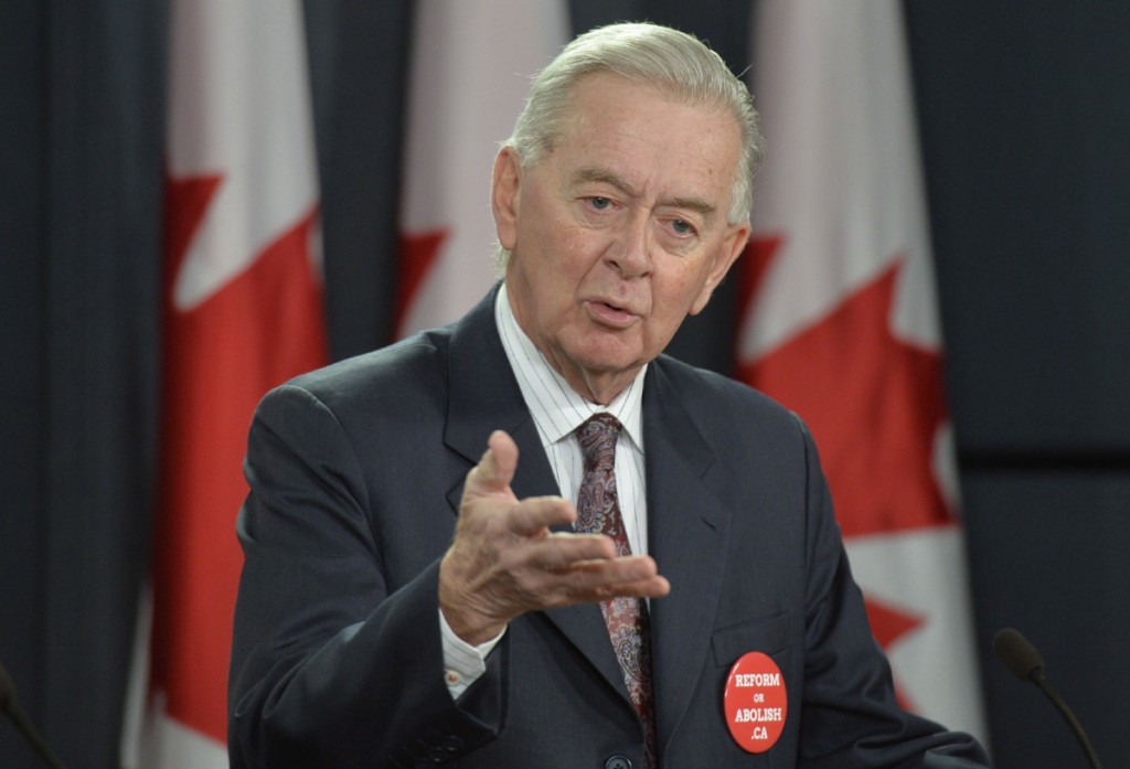 Preston Manning, former Leader of the Reform Party and CEO of the Manning Foundation Preston Manning speaks during a news conference Wednesday January 22, 2014 in Ottawa. THE CANADIAN PRESS/Adrian Wyld